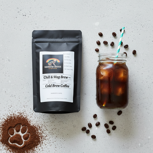 Mason jar cold brew flat lay with coffee ice cubes and paw print in coffee grounds with Chill and Wag Brew coffee
